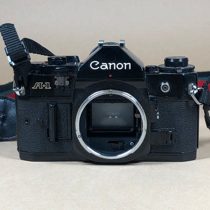 Canon A-1 Black 35mm Focal-Plane Shutter SLR Film Camera with 2 Lens